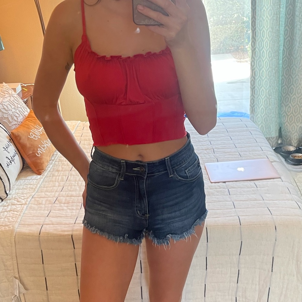 Distressed blue denim jean shorts